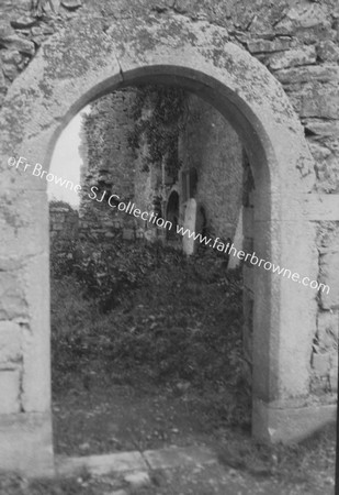 CLONTUSKERT PRIORY DOORWAY IN E. WALL OF NAVE SHOWING CHANCEL